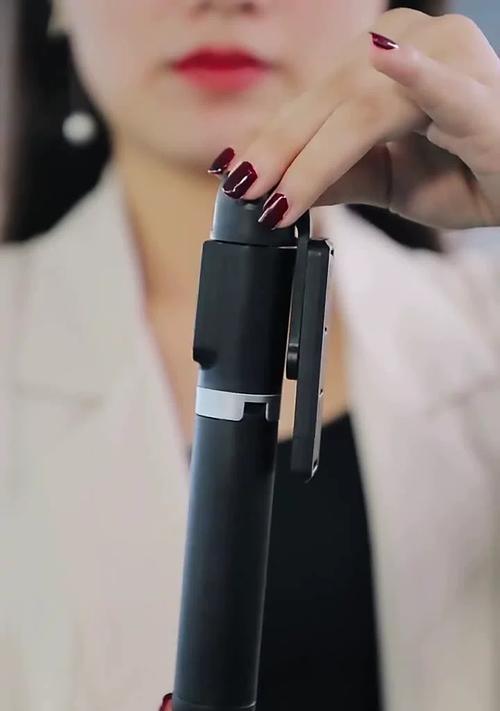 手机支架蓝牙自拍器的作用是什么？